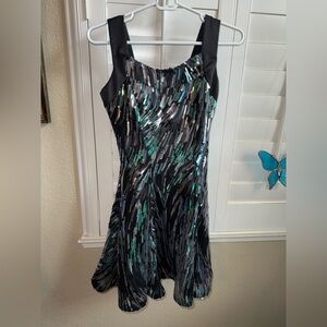 Rivar’s Black Sequin Formal Dress with Green and Silver Accents